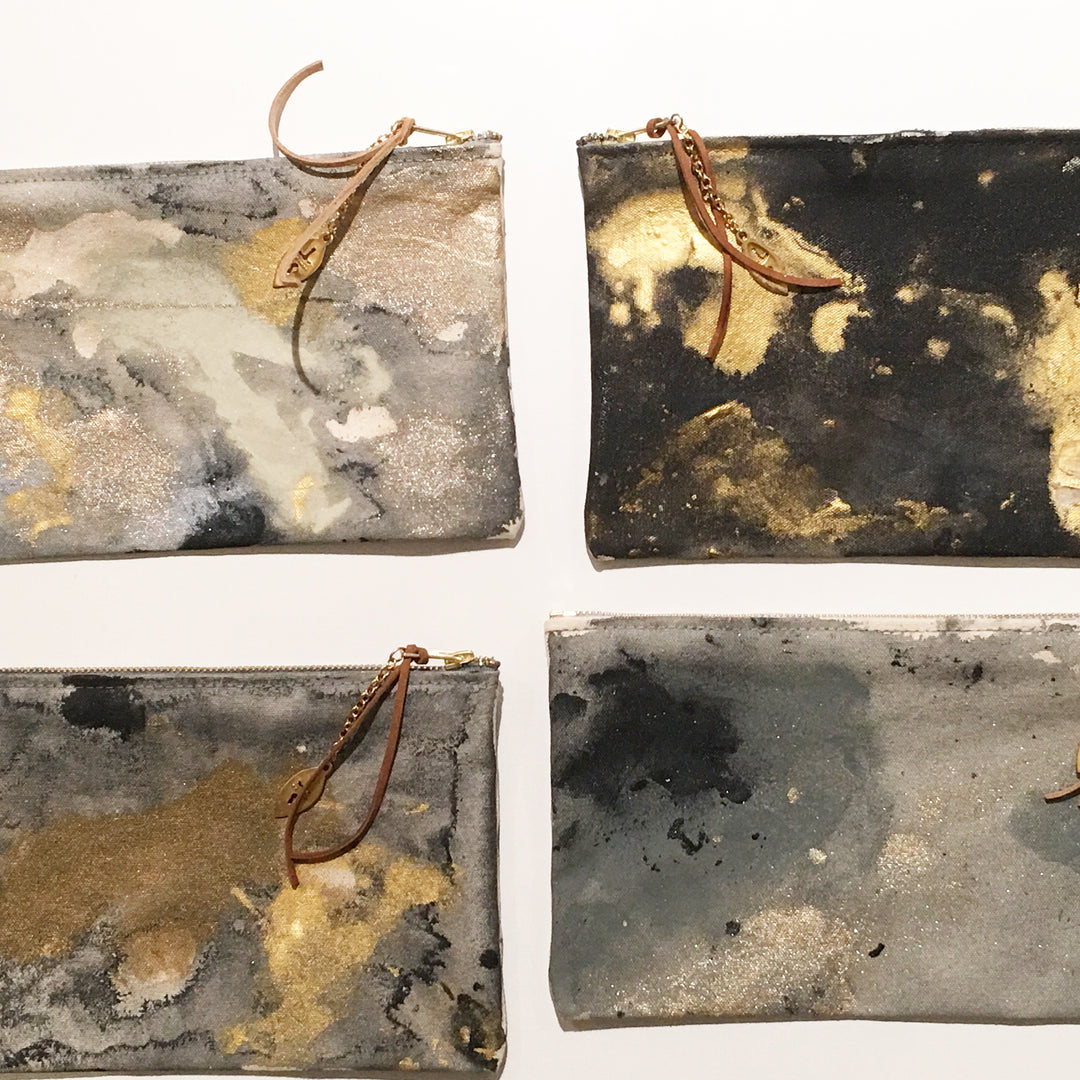 painted canvas clutch